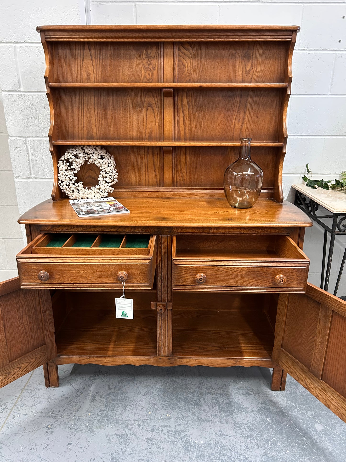 A vintage ERCOL Teak dresser two drawers cupboards plate rack kitchen storage
