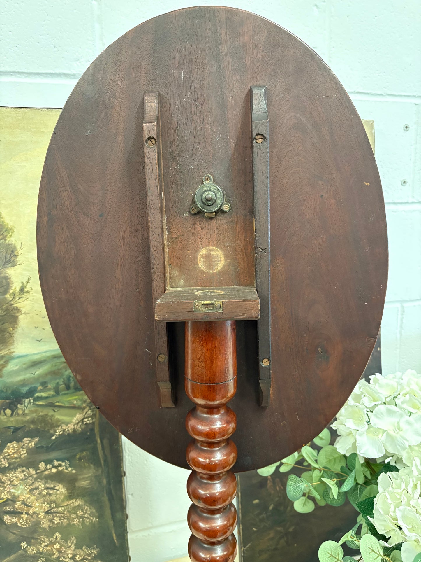 19th century mahogany oval topped occasional table on bobbin support and tripod legs