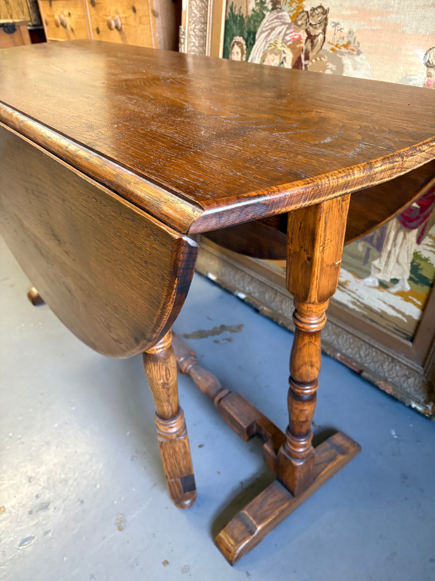 Early 20th century oak gate-leg Dining table - oval top on twin gate turned legs