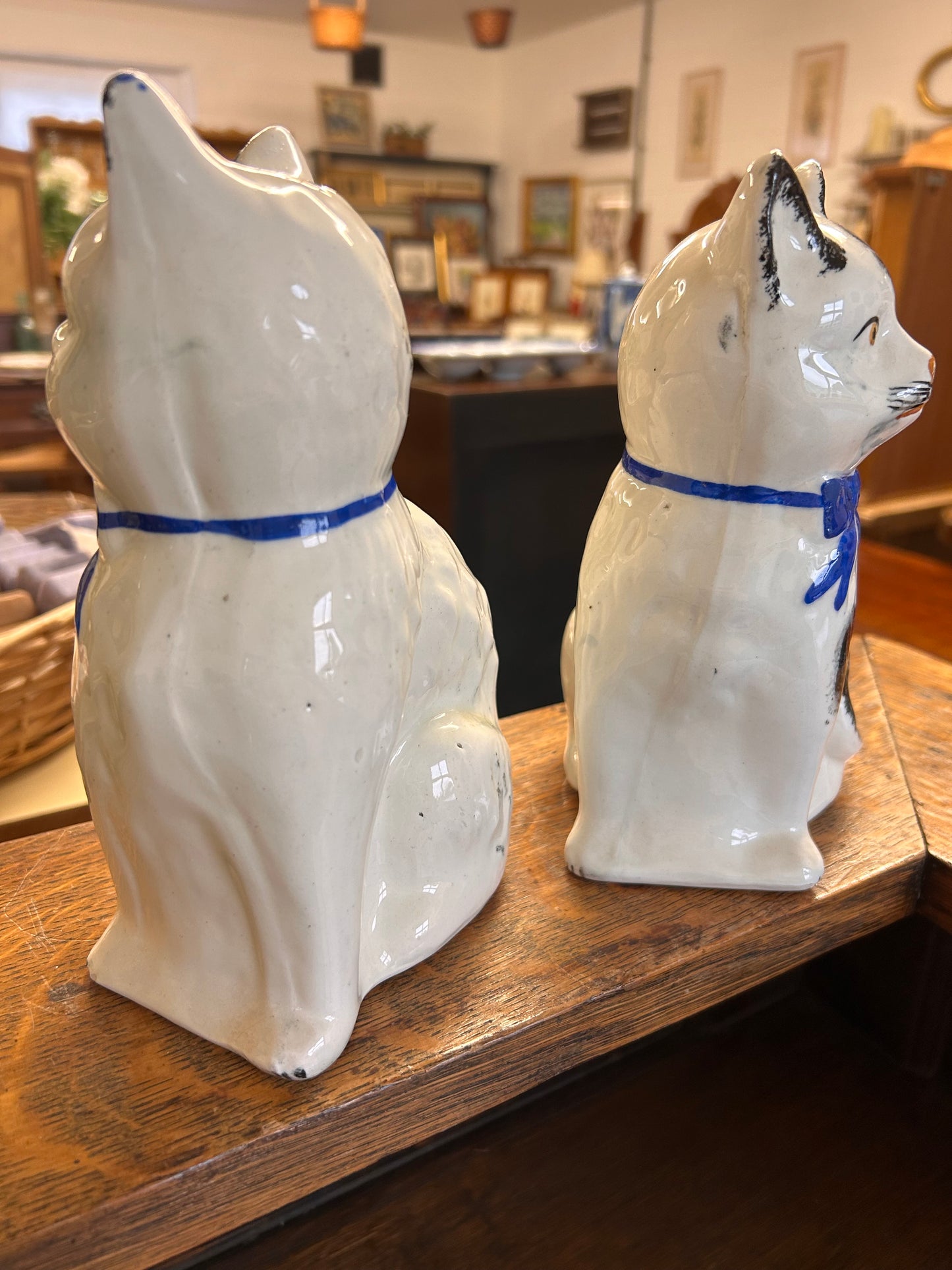 A lovely pair of antique blue white Staffordshire cat figures