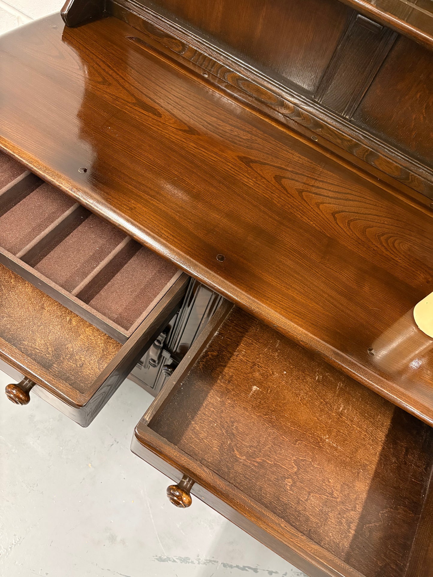 A vintage ERCOL Old Colonial dresser two drawers cupboards plate rack kitchen storage