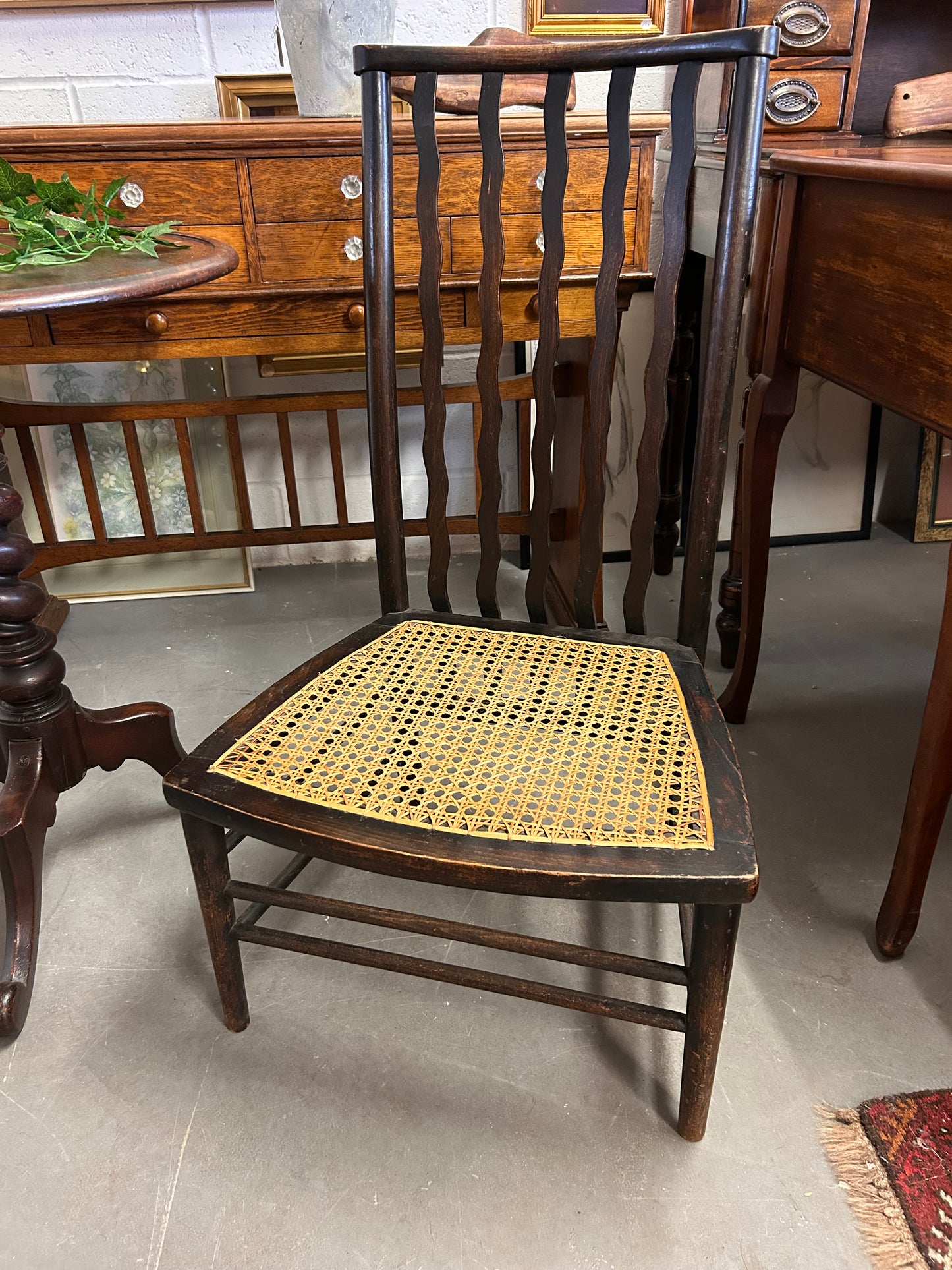 Morris and Co made for Liberty a wavy back rattan seat fireside chair great condition