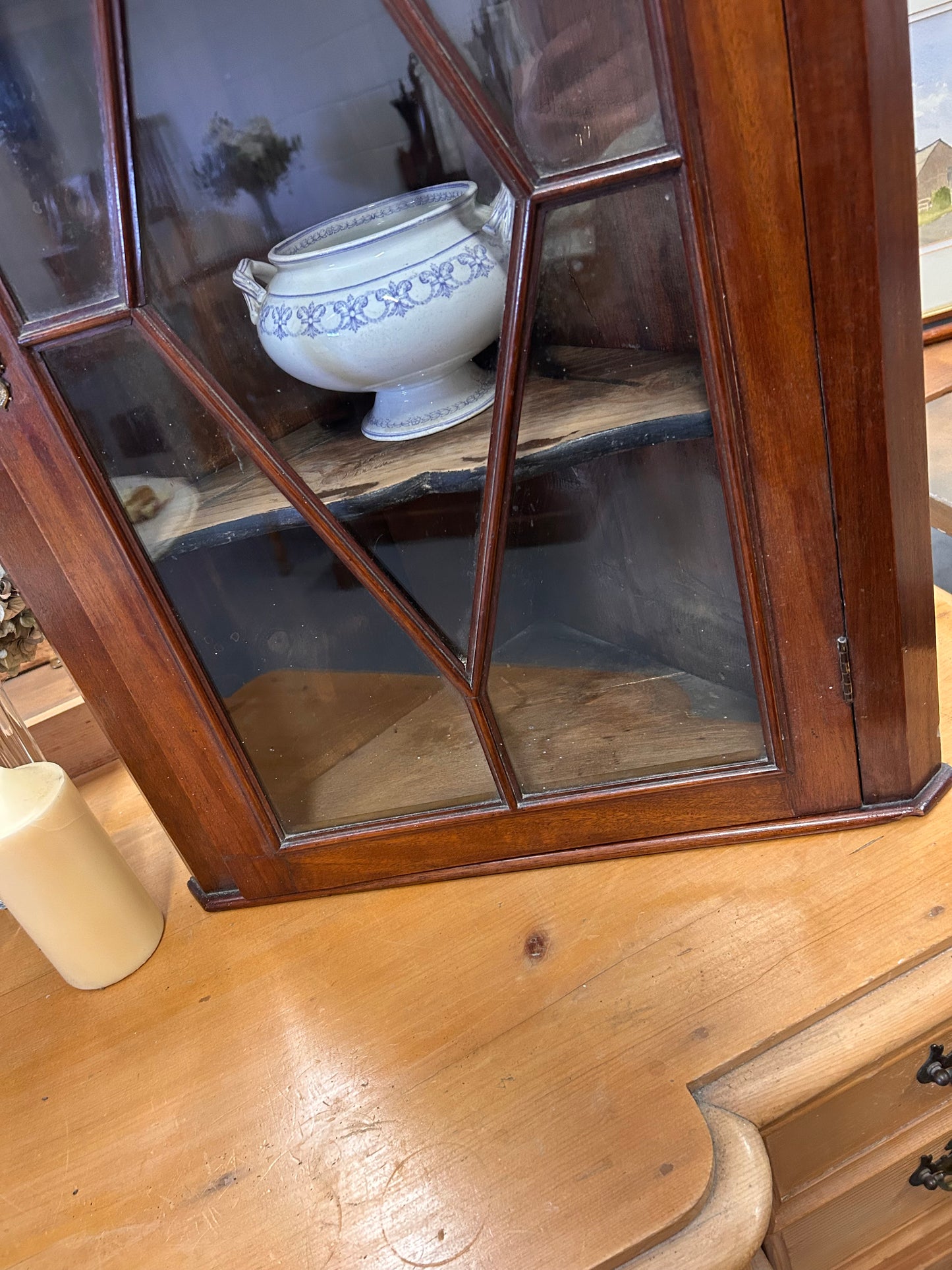 An Edwardian mahogany corner wall cabinet with a glazed front great condition
