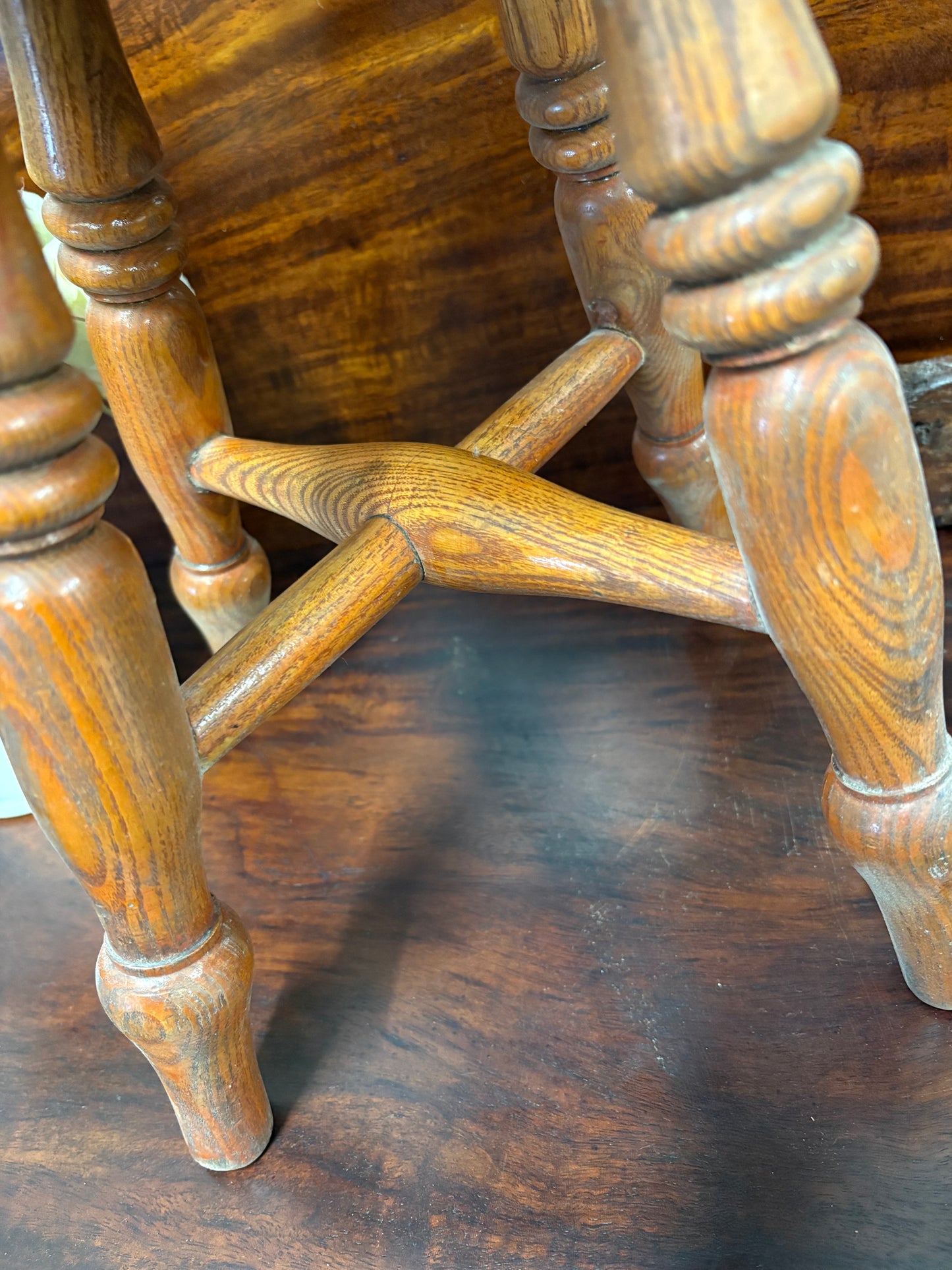 A 19th-century country style hearth / milking stool Turned legs