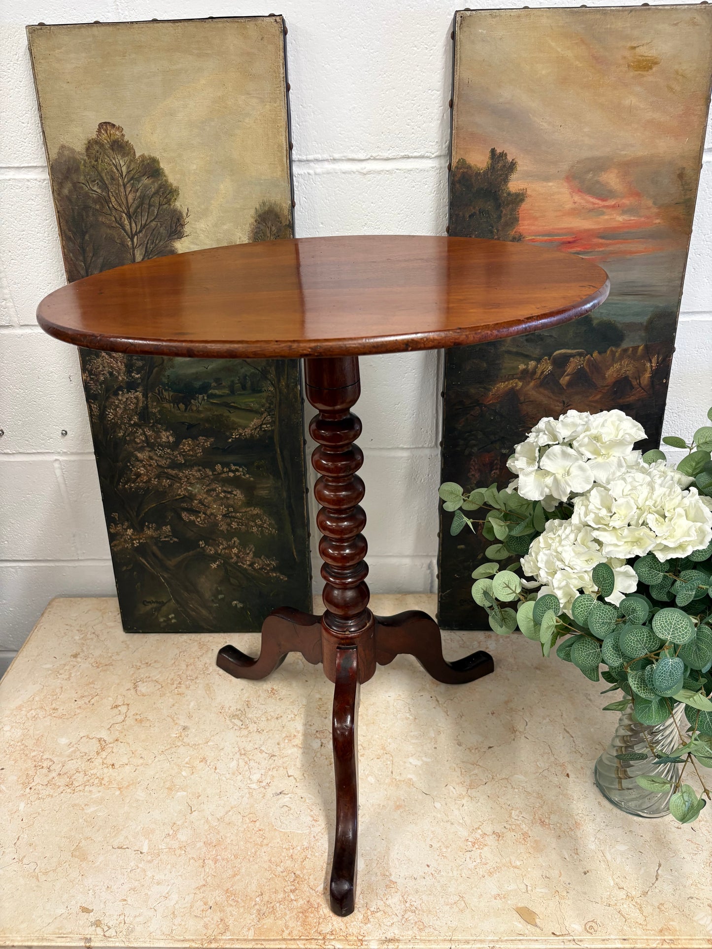 19th century mahogany oval topped occasional table on bobbin support and tripod legs