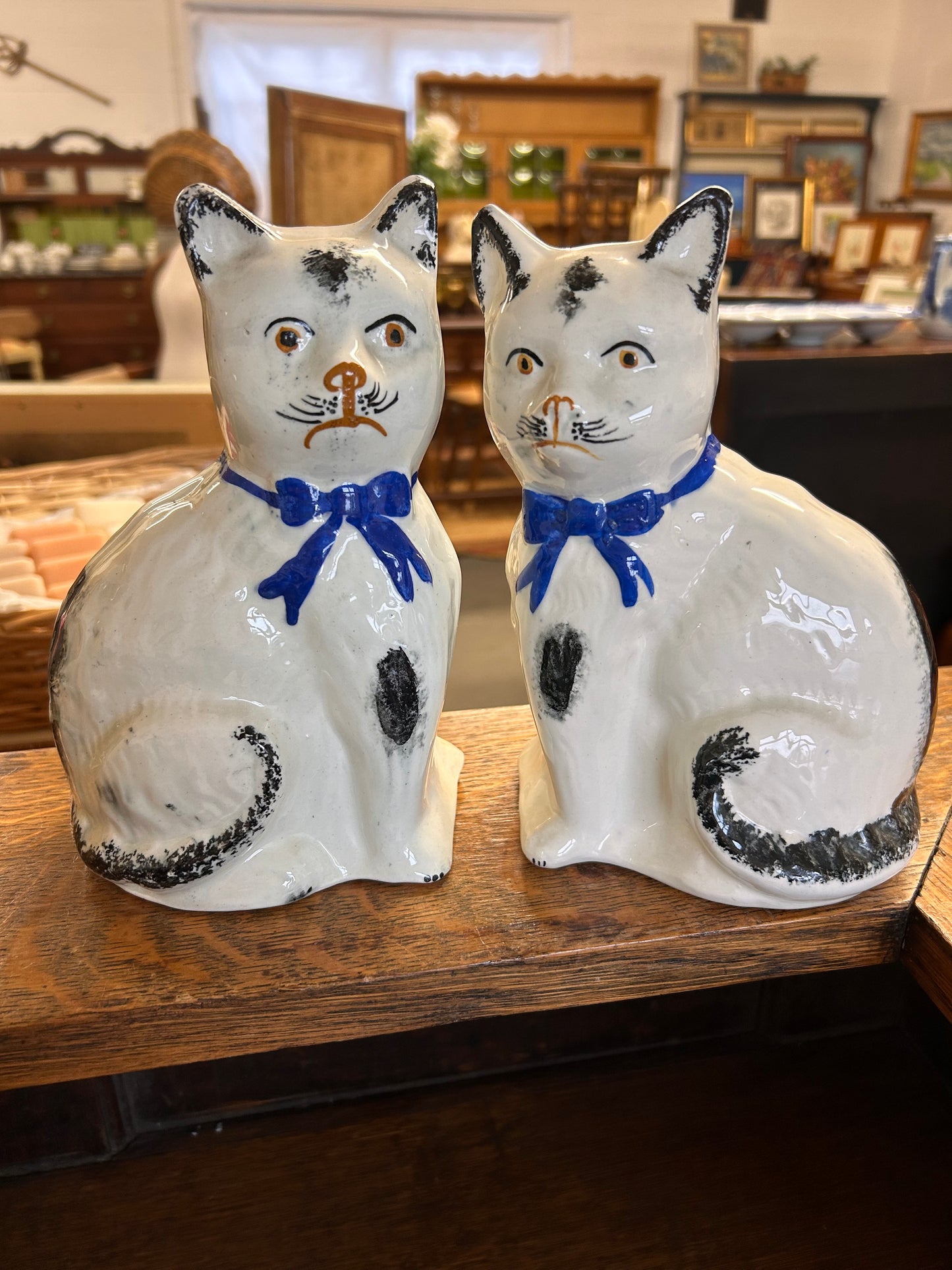 A lovely pair of antique blue white Staffordshire cat figures