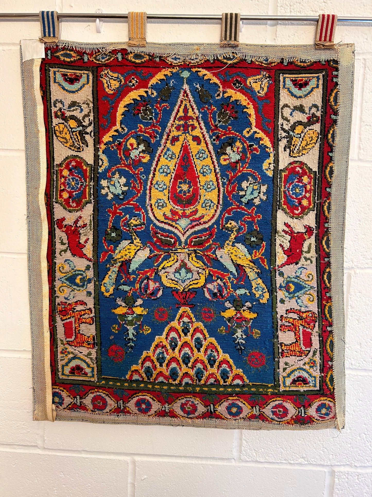 Vintage eastern style wall hanging with pole