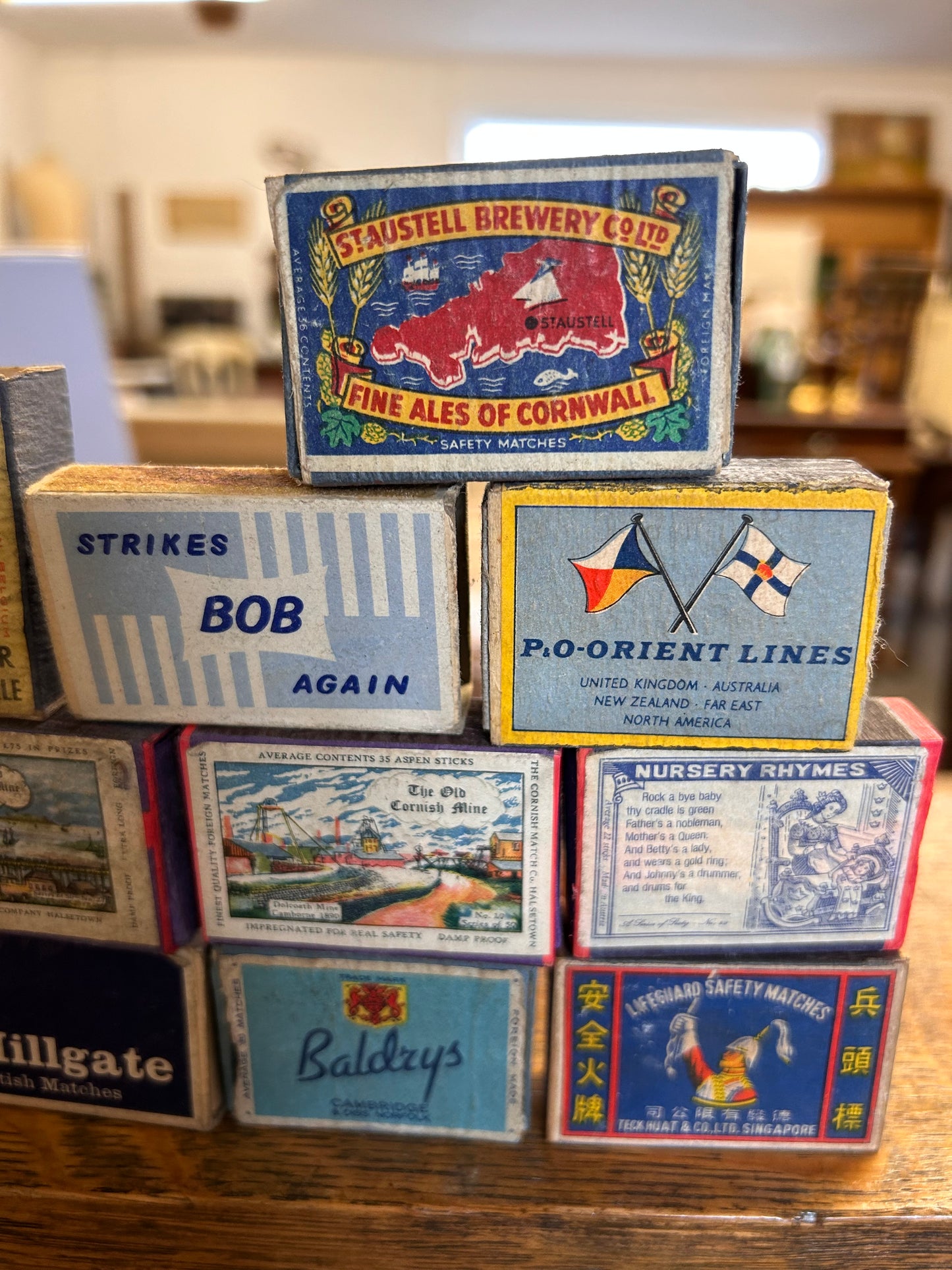 A collection of blue tone vintage match boxes 13 in total great display item