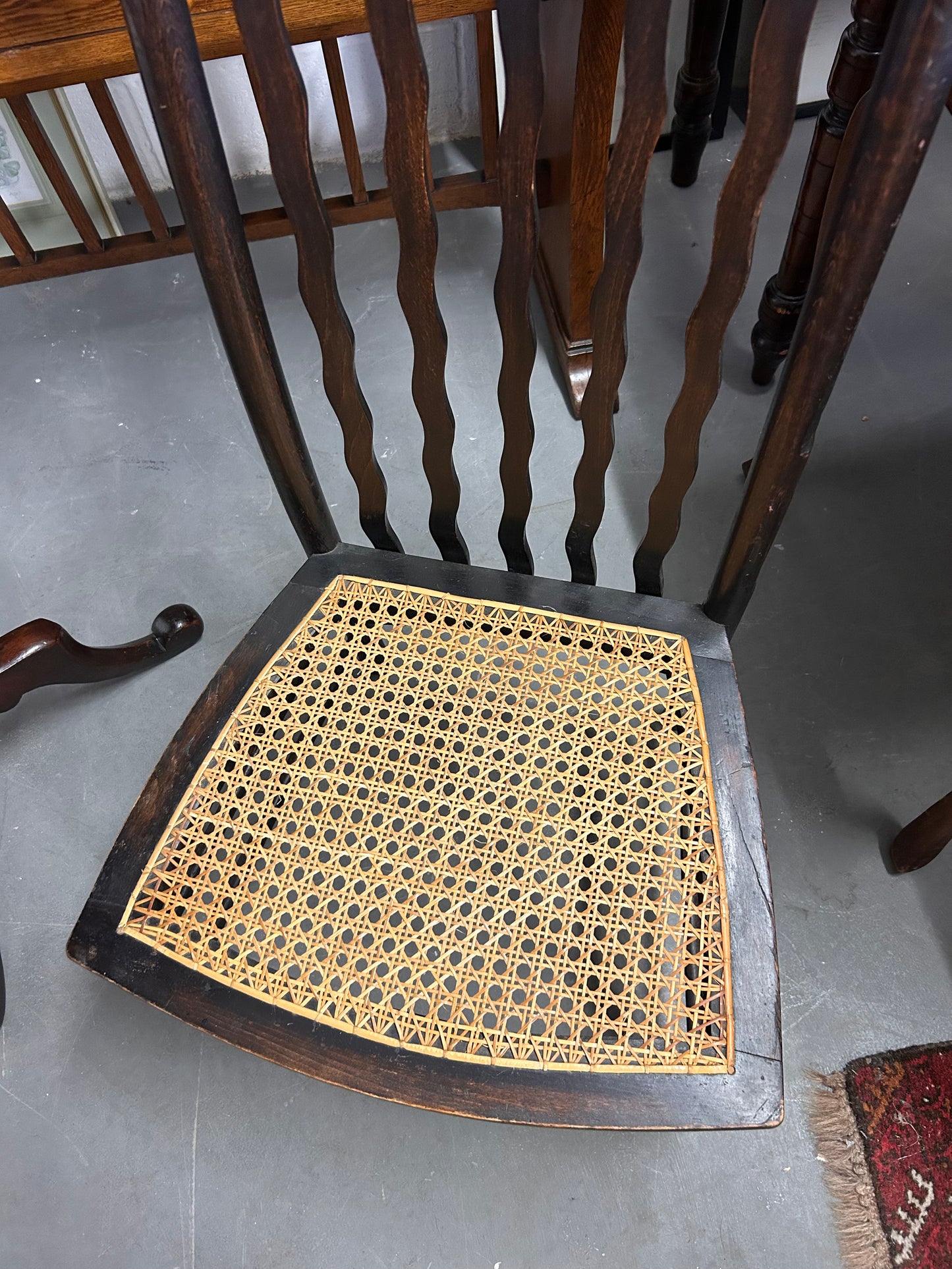 Morris and Co made for Liberty a wavy back rattan seat fireside chair great condition