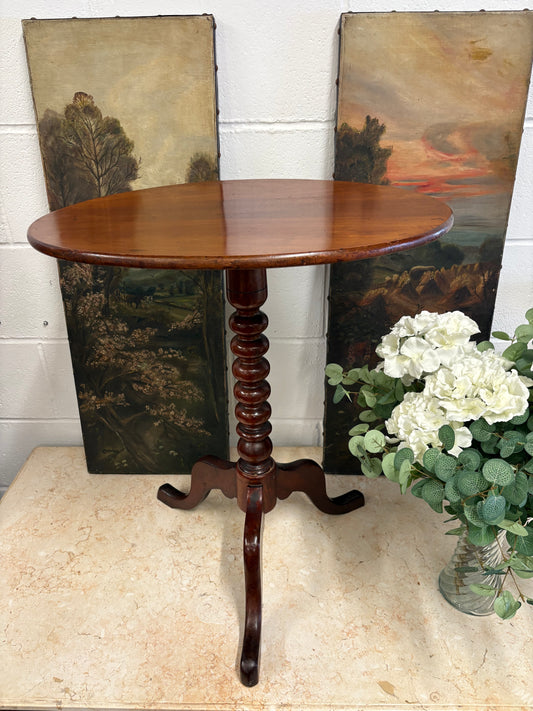 19th century mahogany oval topped occasional table on bobbin support and tripod legs