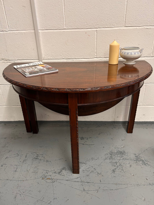 20th century demilune Table with carved edges and opens out to twice the size