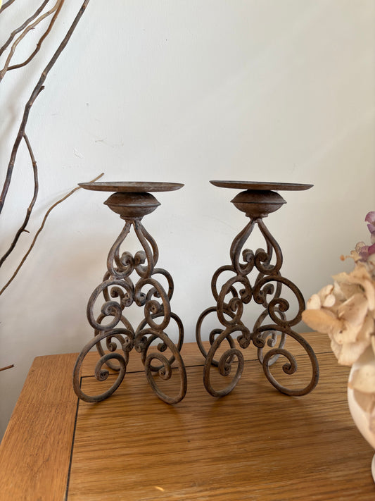 A pair of Ornate vintage metal candle holders highly decorative look