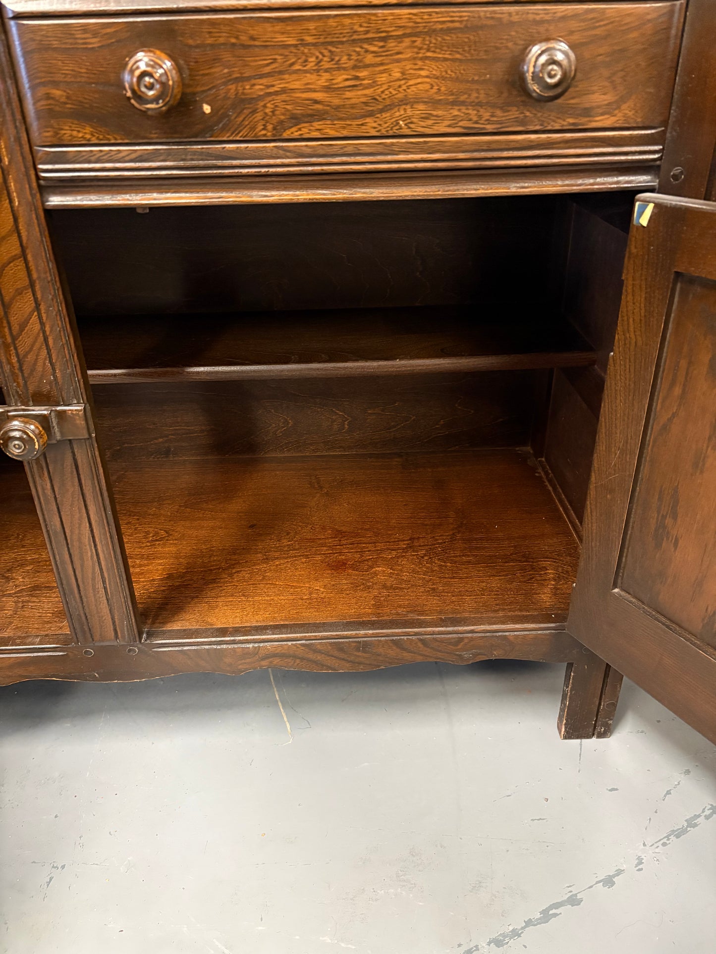 A vintage ERCOL Old Colonial dresser two drawers cupboards plate rack kitchen storage