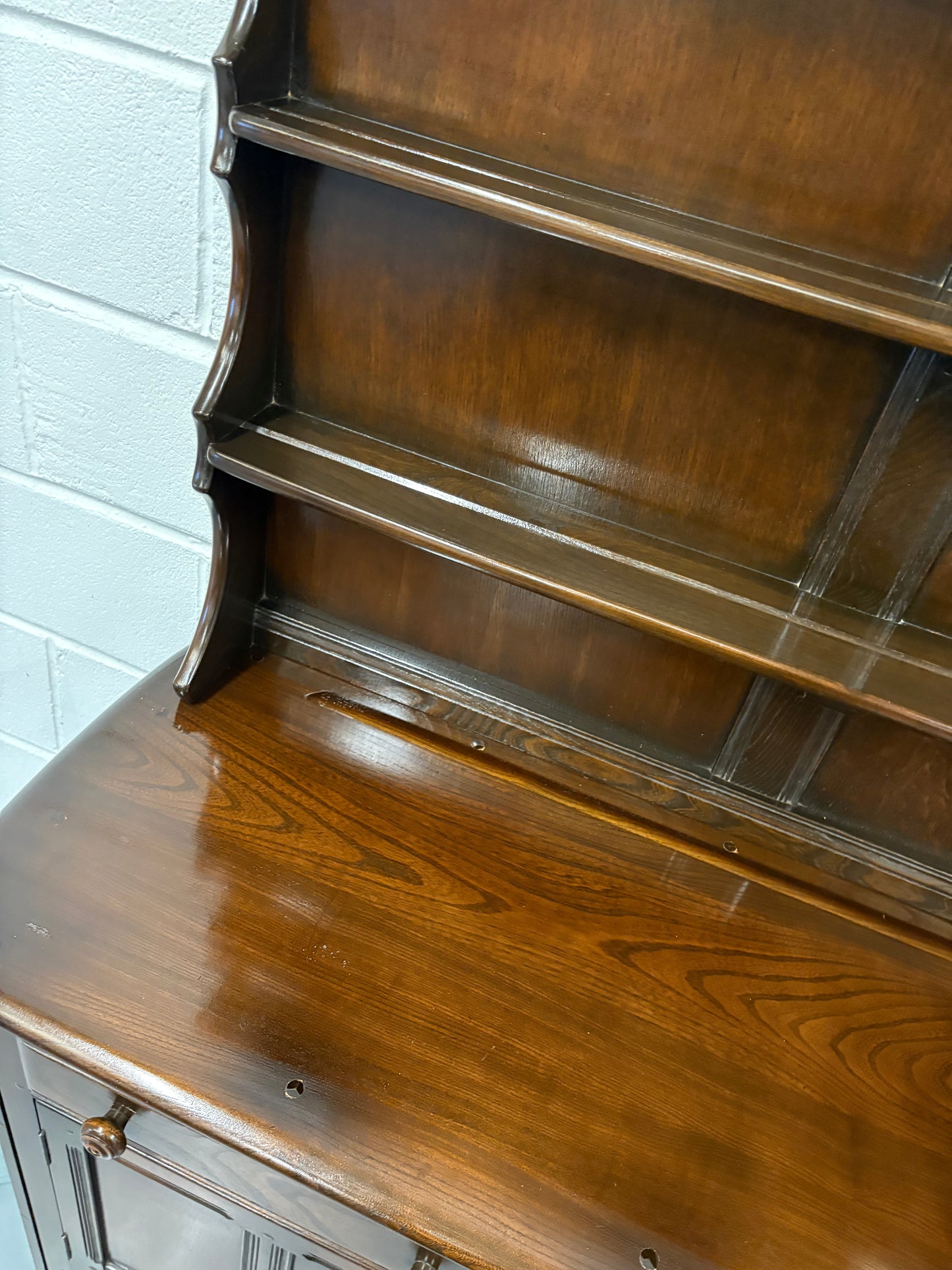 A vintage ERCOL Old Colonial dresser two drawers cupboards plate rack kitchen storage