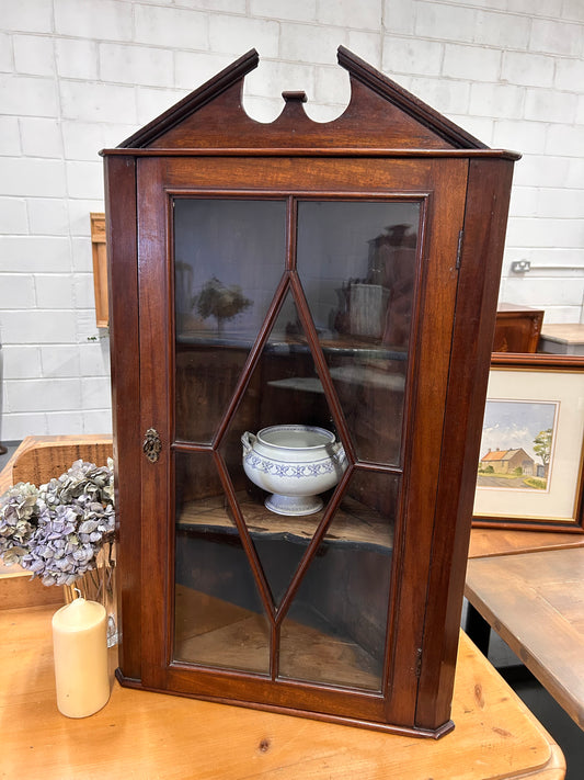 An Edwardian mahogany corner wall cabinet with a glazed front great condition