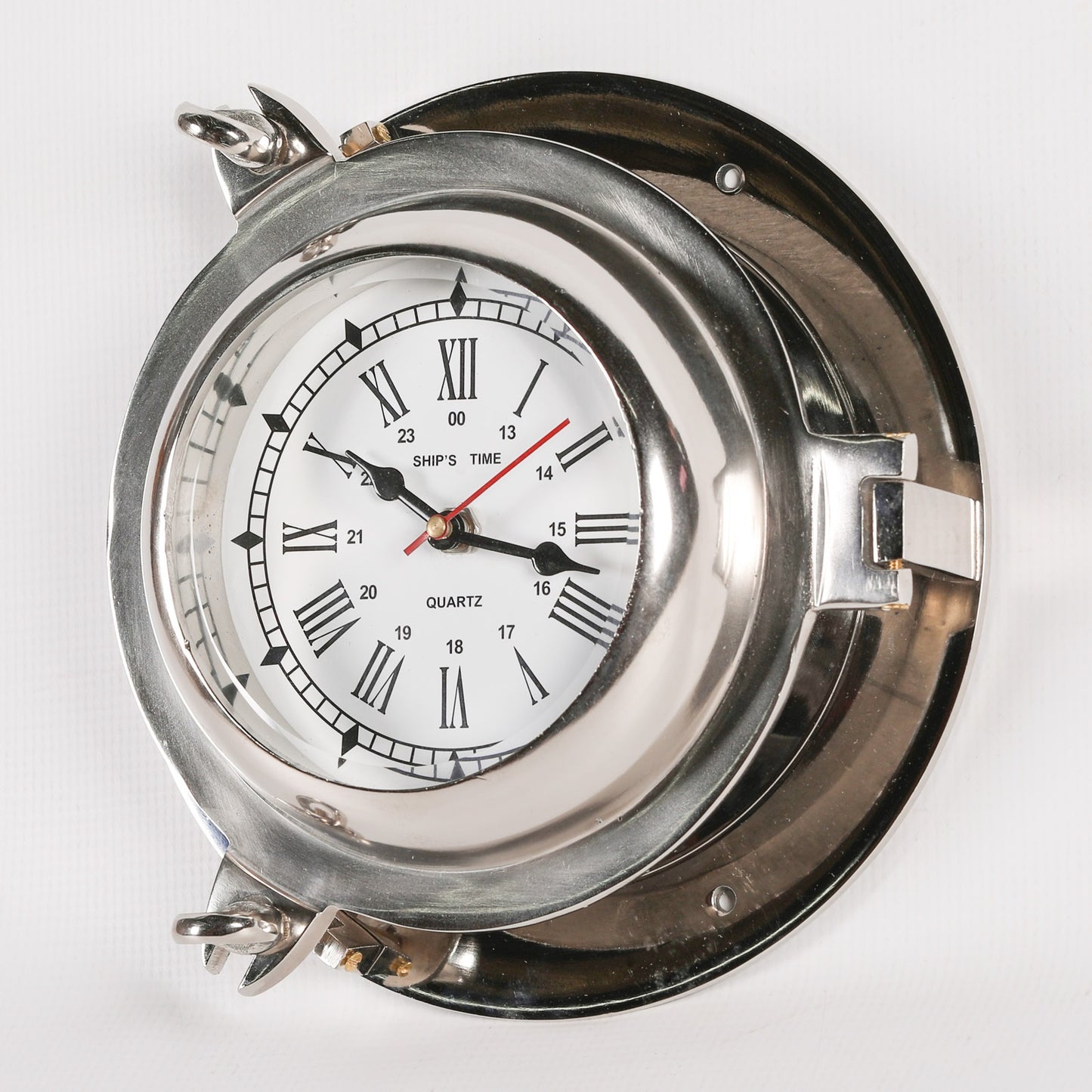 A Polished Metal Nautical Style Cabin Ships Wall Clock