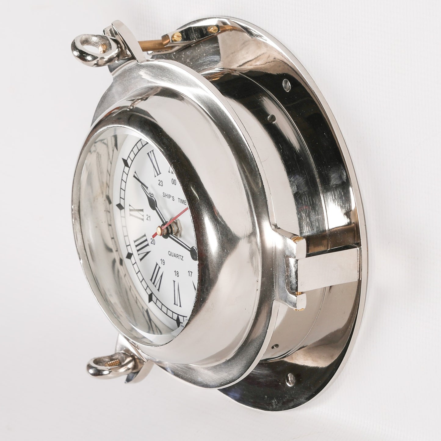 A Polished Metal Nautical Style Cabin Ships Wall Clock