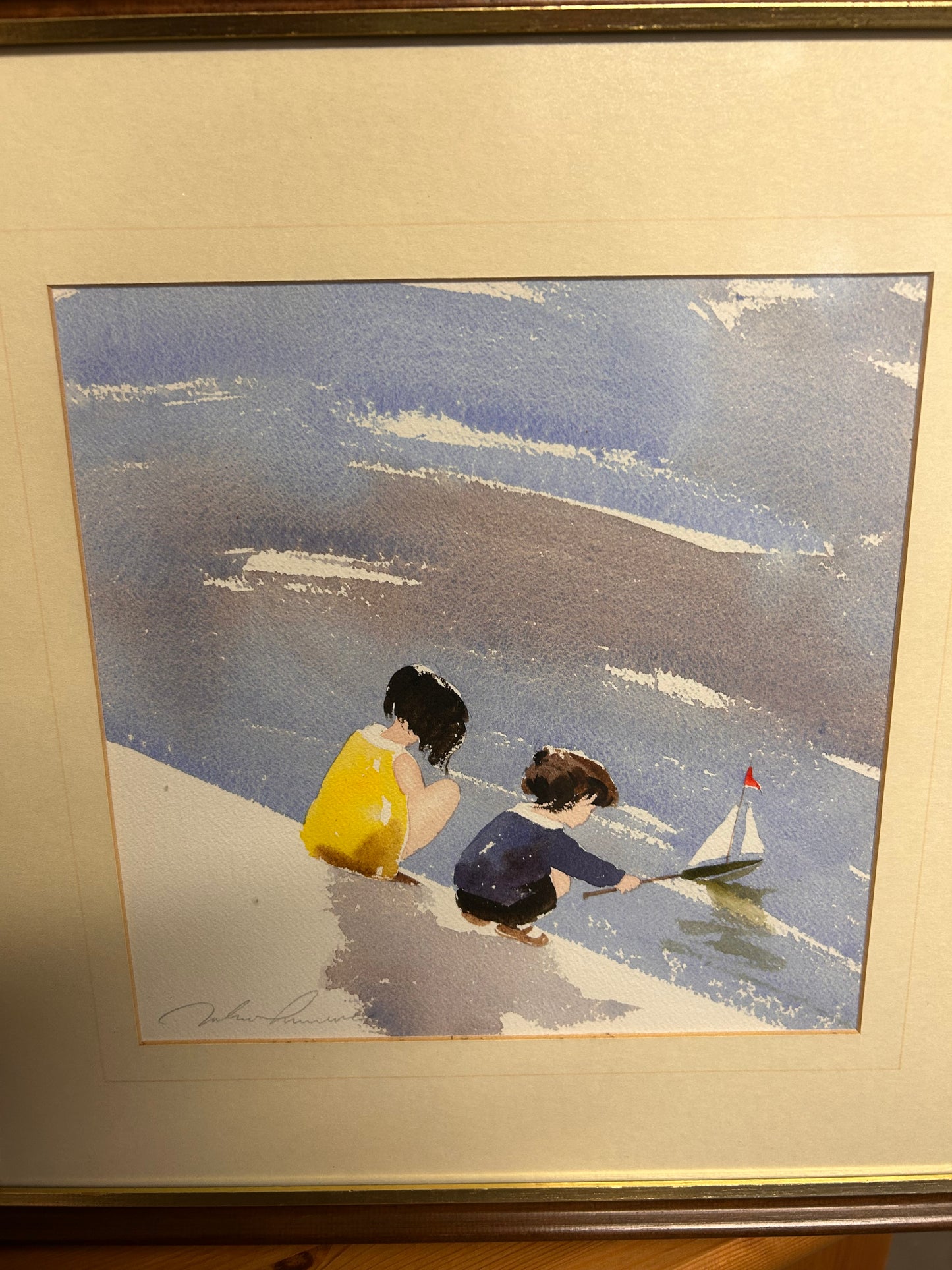 Delightful signed watercolour of children by water framed and glazed