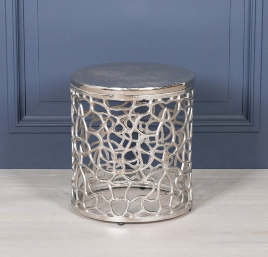 A single Round Silver Aluminium Decorative Fretwork Side table