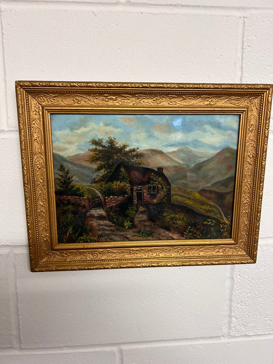 Antique oil of hillside cottage decorative frame and glazed