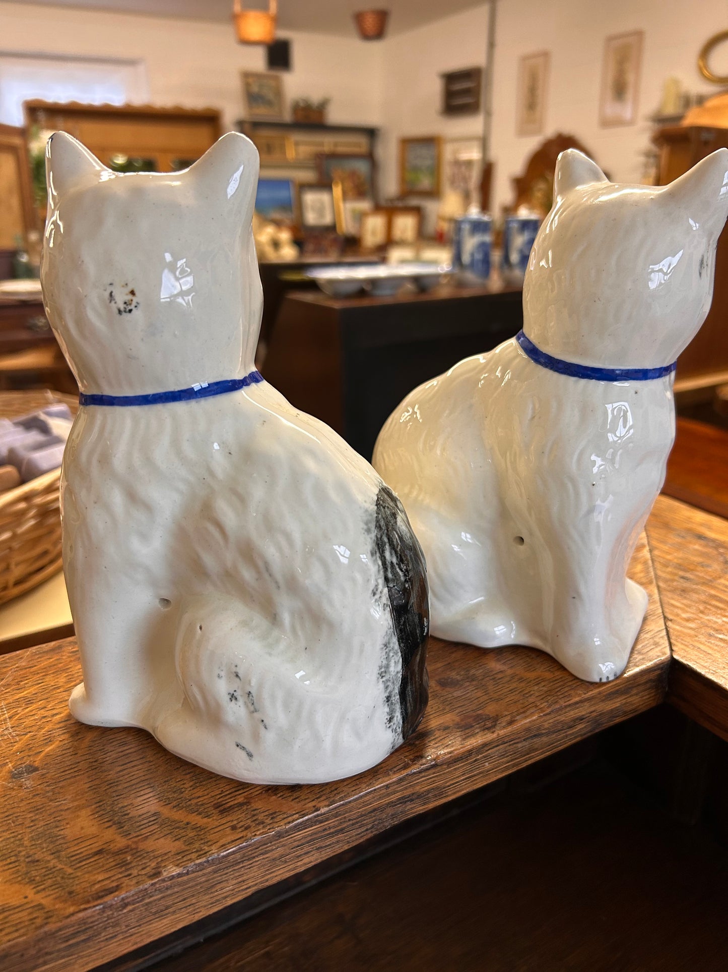 A lovely pair of antique blue white Staffordshire cat figures