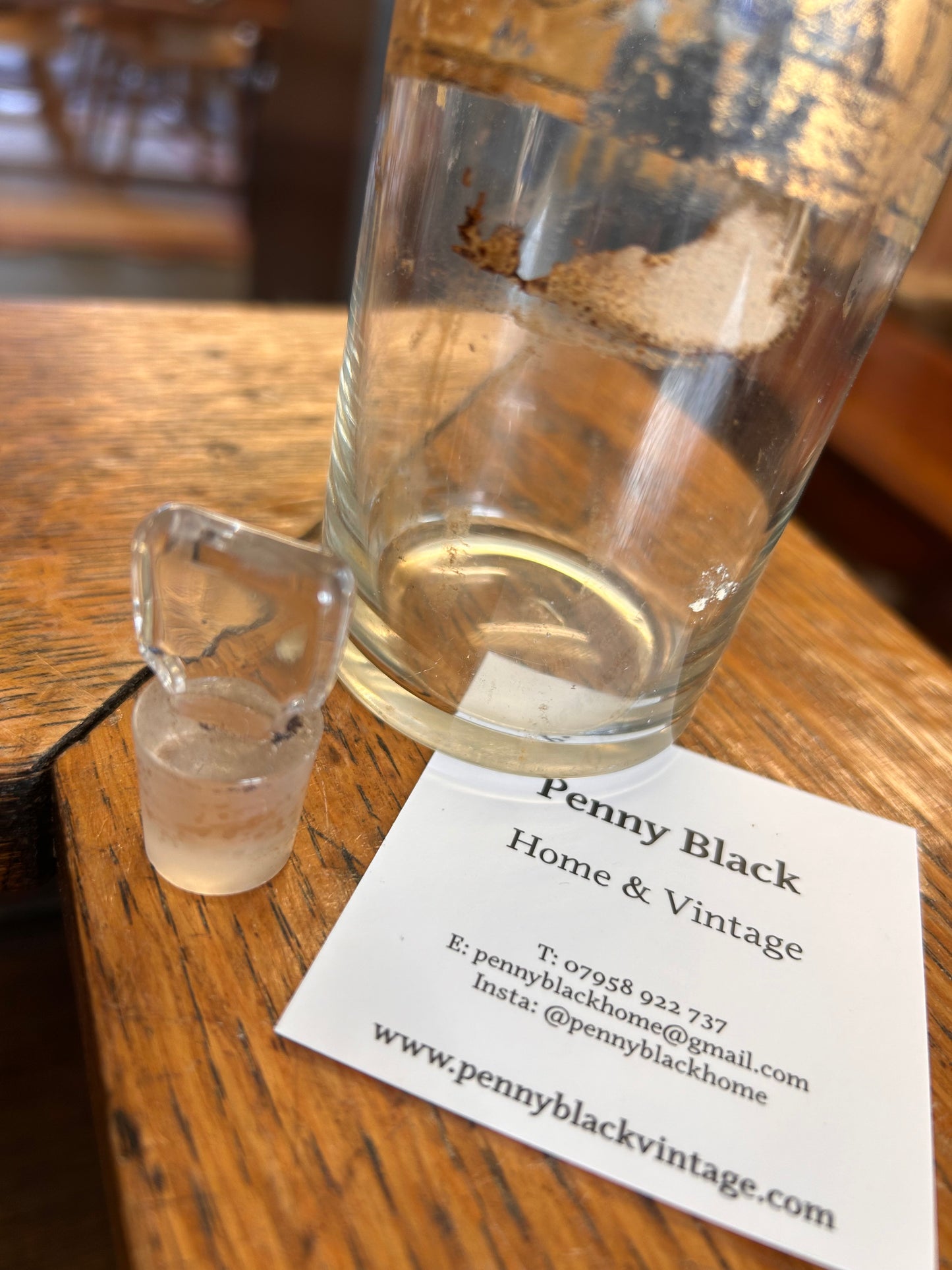 A Victorian apothecary chemists bottle with label and ground glass stopper.