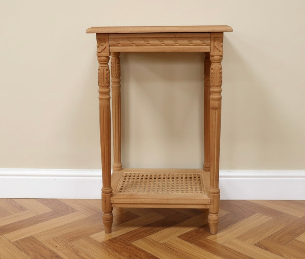 Carved Teak wooden side table with rattan undershelf waxed natural look